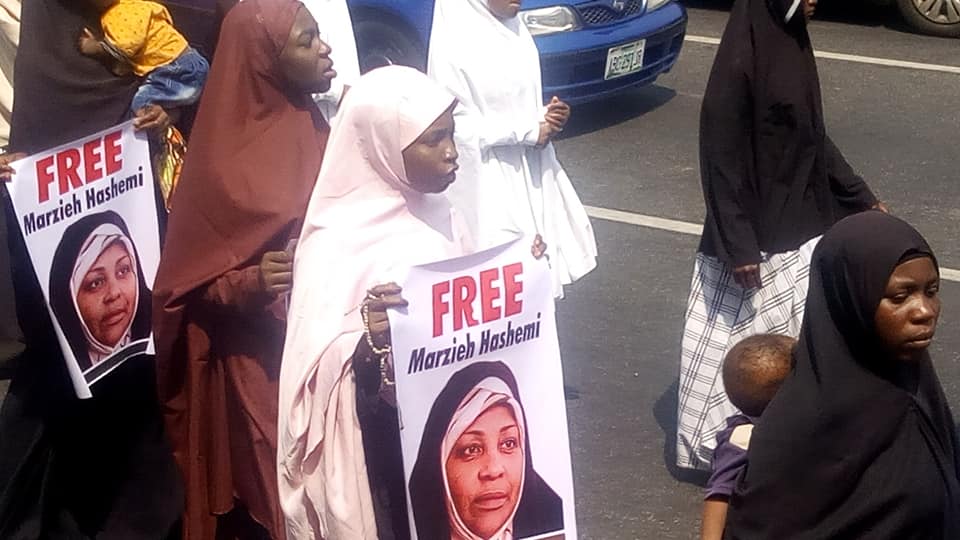sisters protest arrest of marzieh in abuja